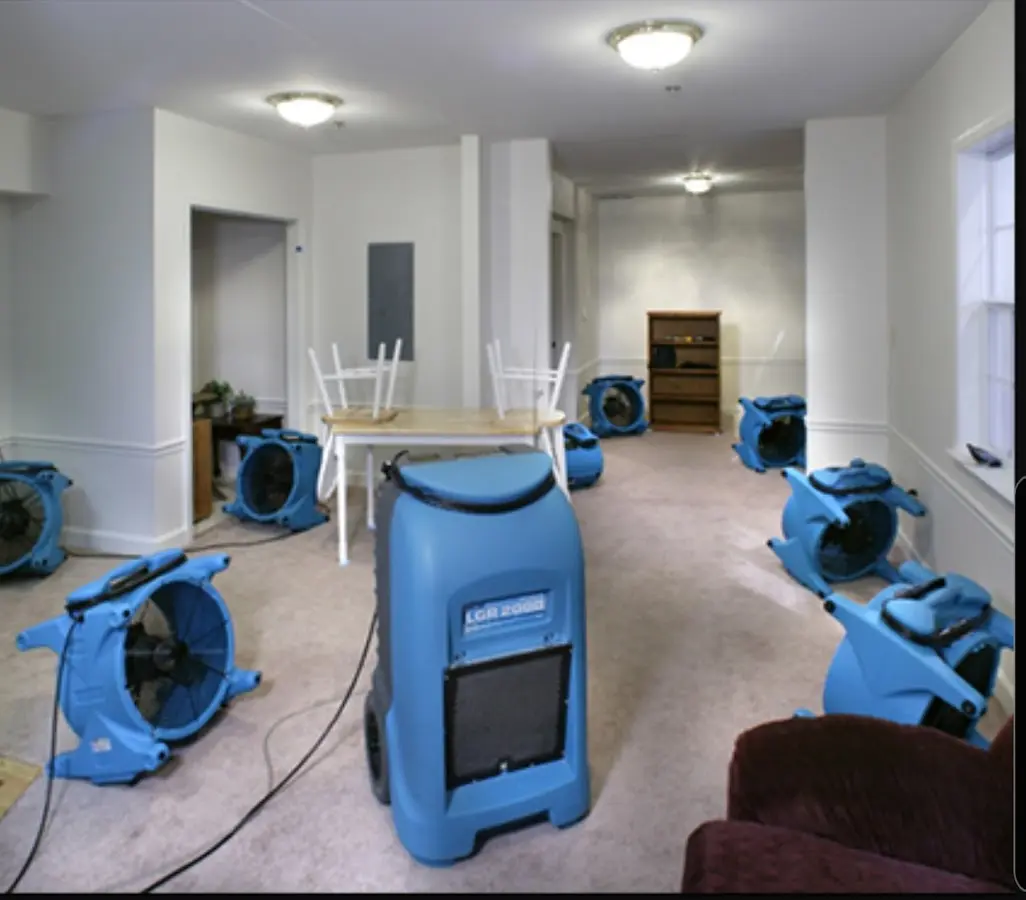 Air movers and dehumidifier setup for Water Damage Restoration in League City